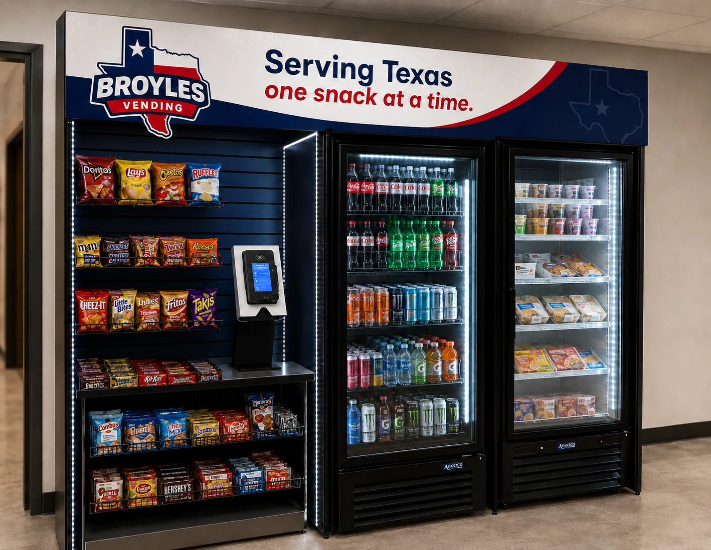 Angled view of Broyles Vending micro market with snacks, beverages, fresh food, and self-checkout kiosk